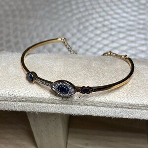 Swarovski Evil Eye Bangle Bracelet Gold-Tone Blue Crystal Small Swan Logo